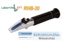 Czarny refraktometr ręczny z napisami LABORNITE KFT oraz RHB-20.